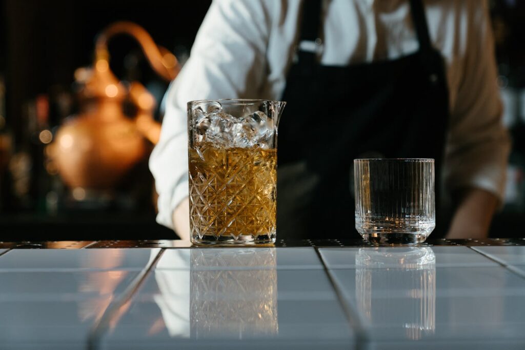 Clear Drinking Glass With Brown Liquid